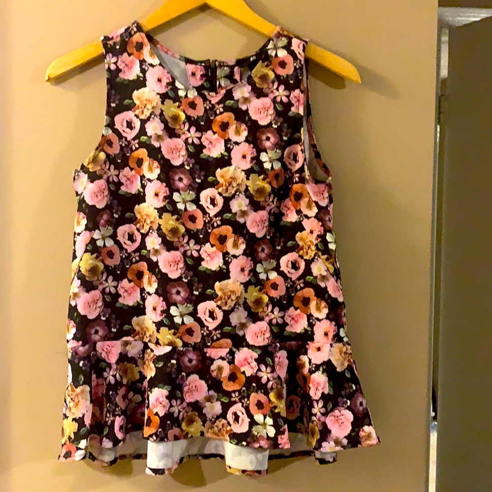 Floral sleeveless top. New condition